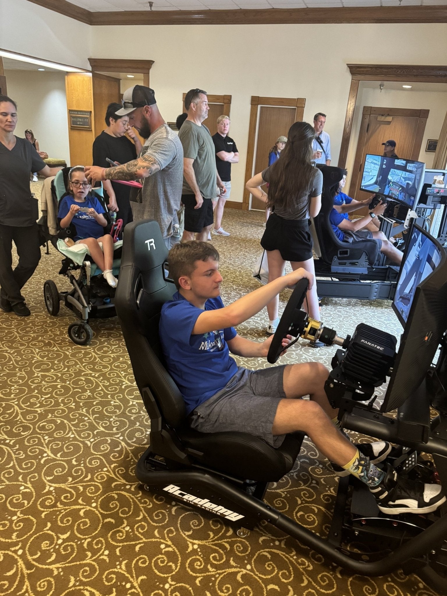 Driving Dreams: How Racing Simulators from Academy Sim Racing Make a Difference for Charity Events - Academy Sim Racing